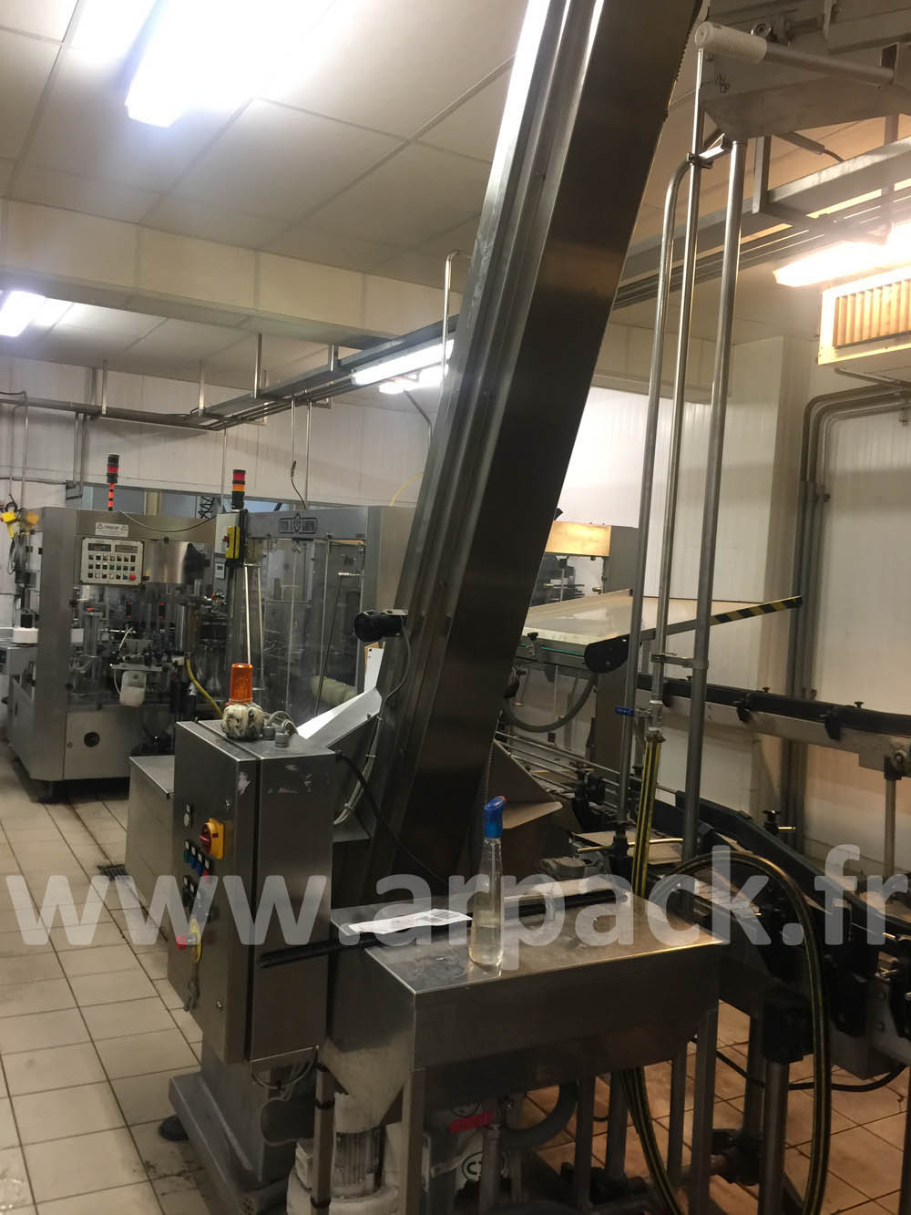 Alimentateur de capsules, bouchons Arol